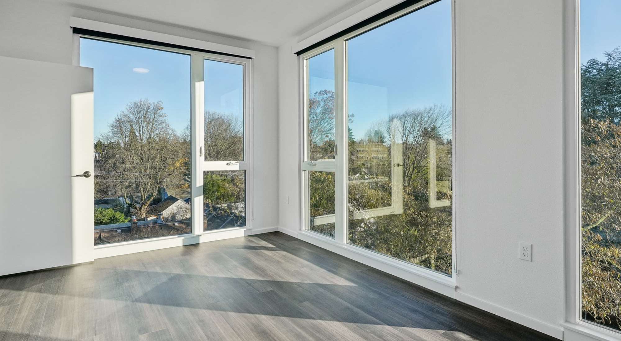Oversized windows for natural light and views Rothko Residences in Portland, Oregon