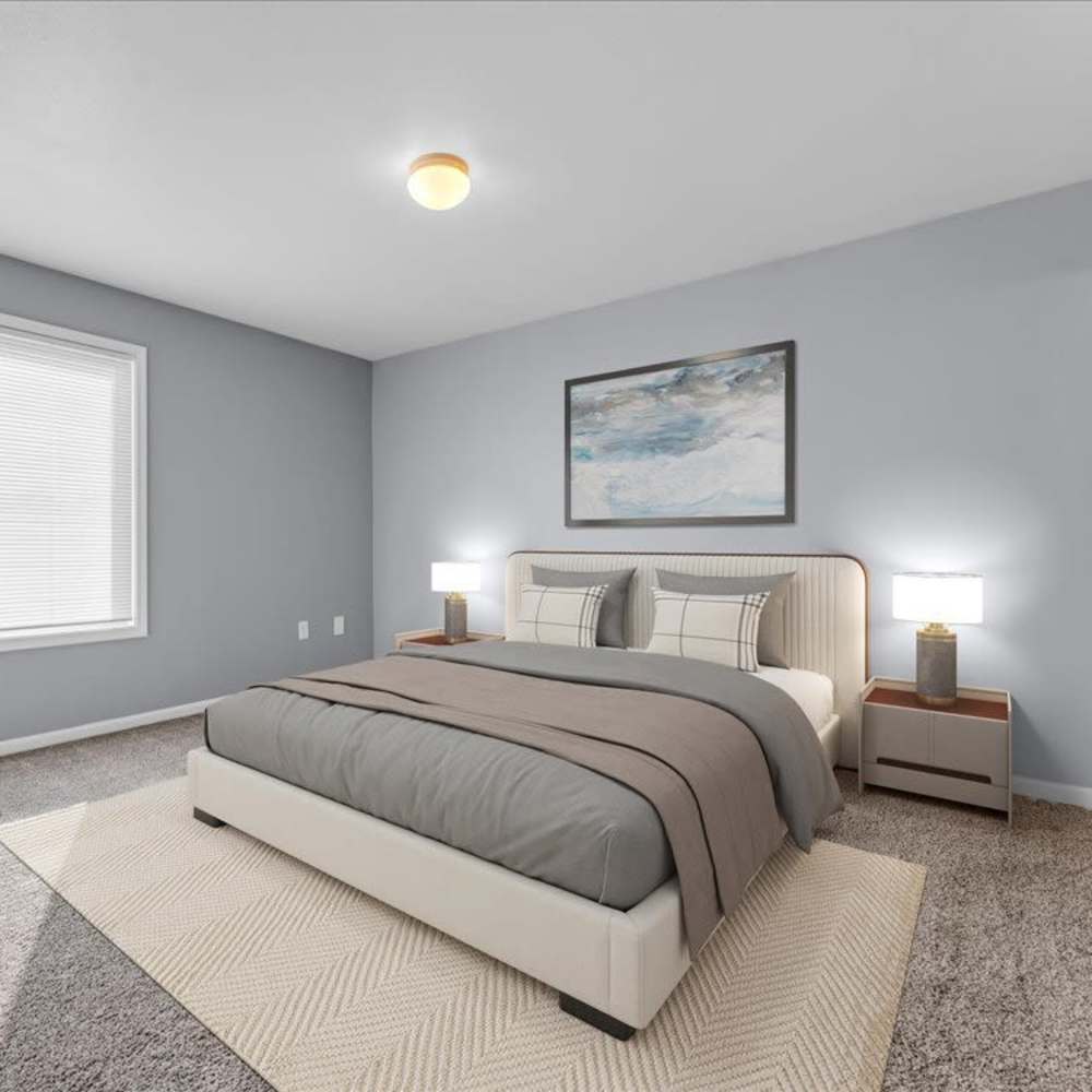 Bedroom with neutral finishes at River Club in Holland, Michigan