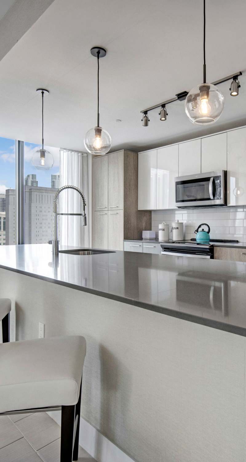 large kitchen with modern appliances at ParkLine Miami in Miami, Florida