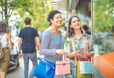 Resident out shopping downtown with her mother near Signal Pointe Apartment Homes in Winter Park, Florida