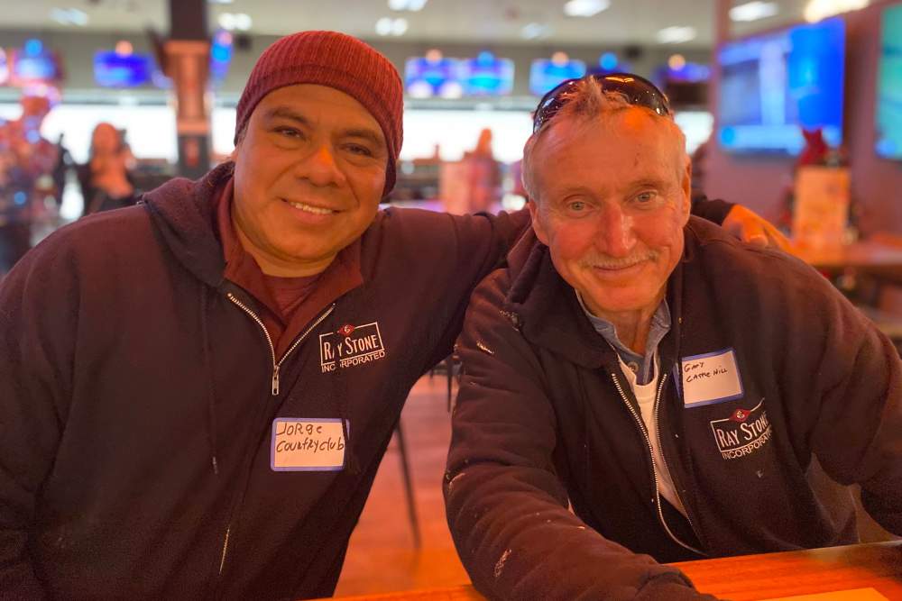 Employee at festival booth event Ray Stone Inc.