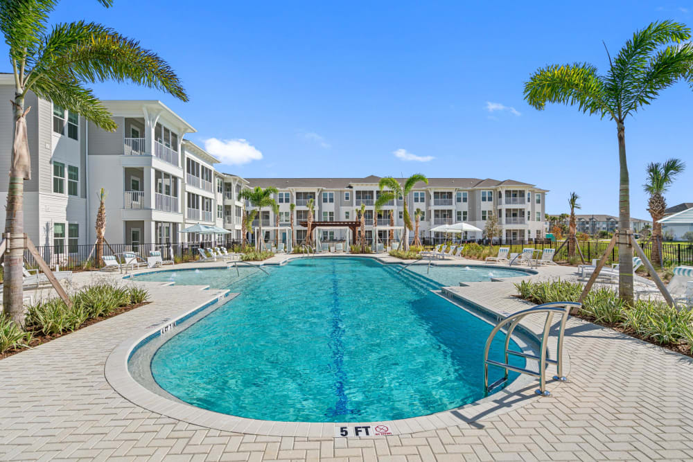 Resort-style swimming pool at The Griffon Vero Beach in Vero Beach, Florida