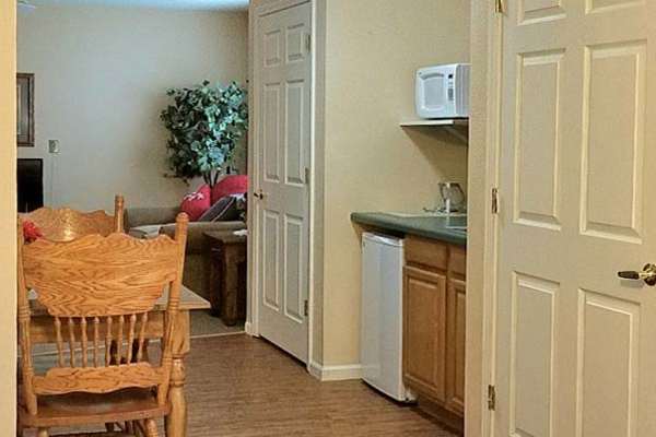 Assisted living apartment kitchen at Victorian Place of Hermann in Hermann, Missouri