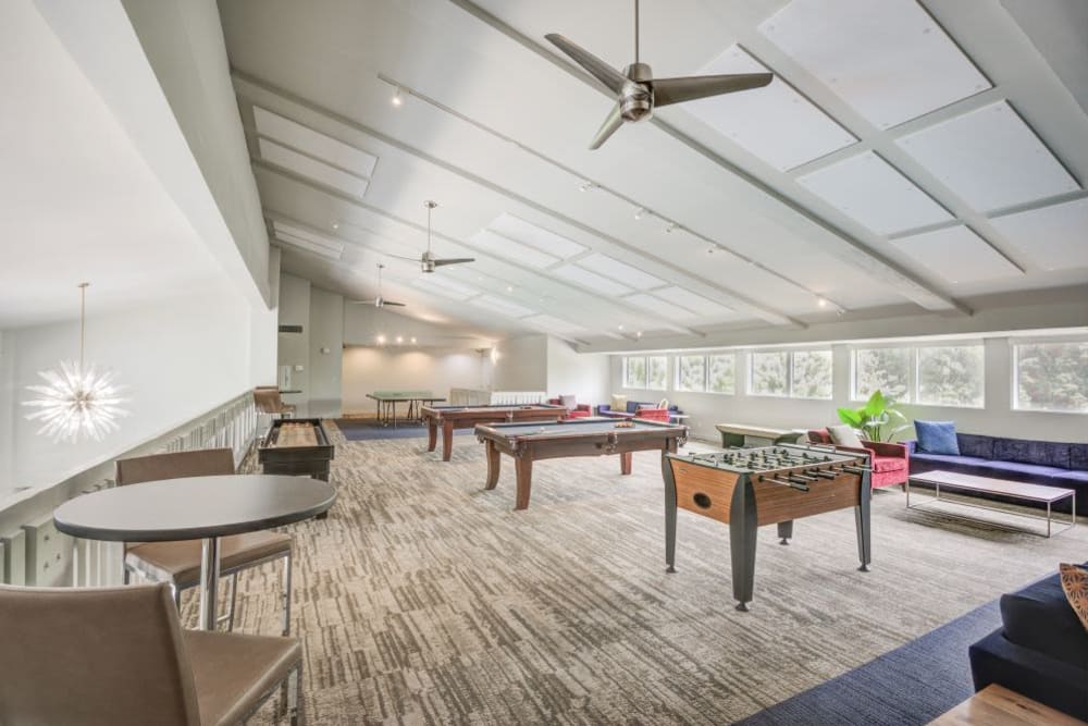 Gaming room with ping pong, billiards, and foosball tables at The Villas at Woodland Hills in Woodland Hills, CA