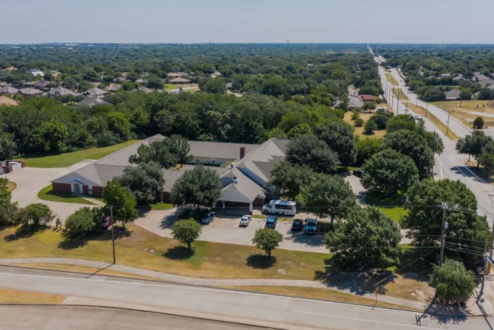 Aerial view of property and street at Deer Creek Senior Living in Desoto, Texas
