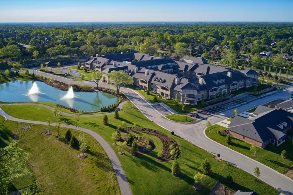 Aerial view of the community and surrounding lush landscape at Blossom Ridge in Oakland Charter Township, Michigan