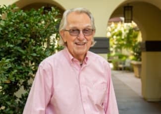 A resident outside at Sunset Lake Village Senior Living in Venice, Florida