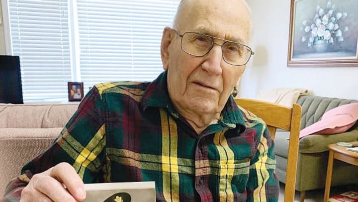 Resident Ray Curtis celebrating his 104th birthday