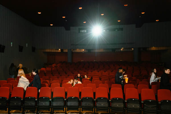 Resident in cinema theater near Collier in Pflugerville, Texas