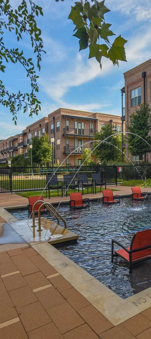 Resort style saltwater pool sundeck cabana at Flatiron District at Austin Ranch in The Colony, Texas