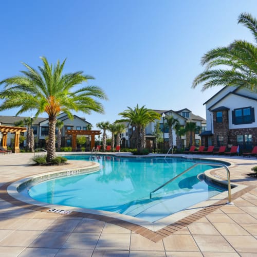 Resort-style swimming pool on a beautiful day at The Hawthorne in Jacksonville, Florida