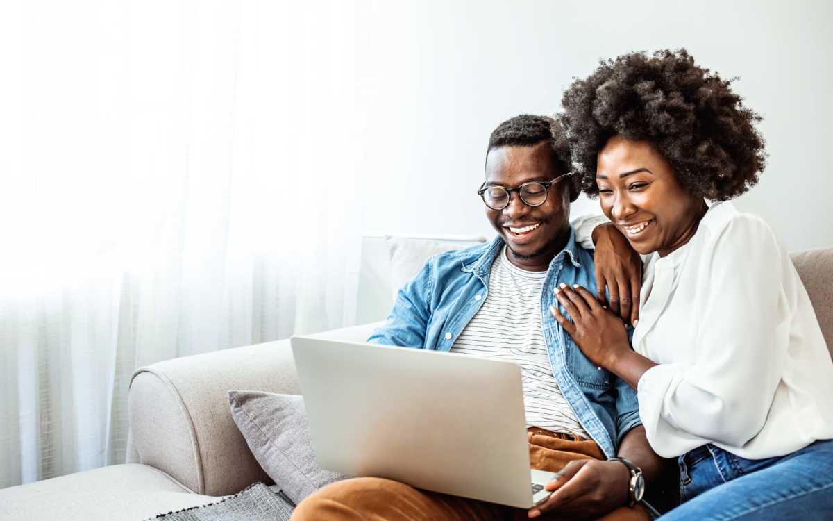 Happy couple in their new apartment at The Daphne in Houston, Texas