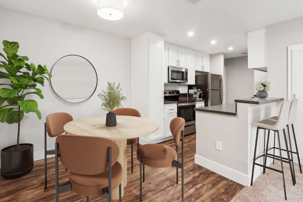 Dining area and kitchen at Muirwood Apartment Homes in Martinez, California