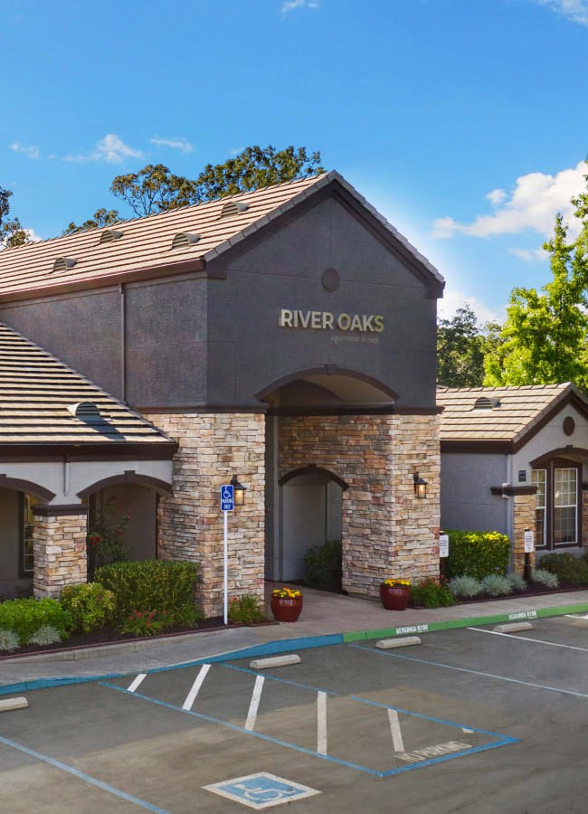 Exterior of the clubhouse at dawn at River Oaks Apartment Homes in Vacaville, California