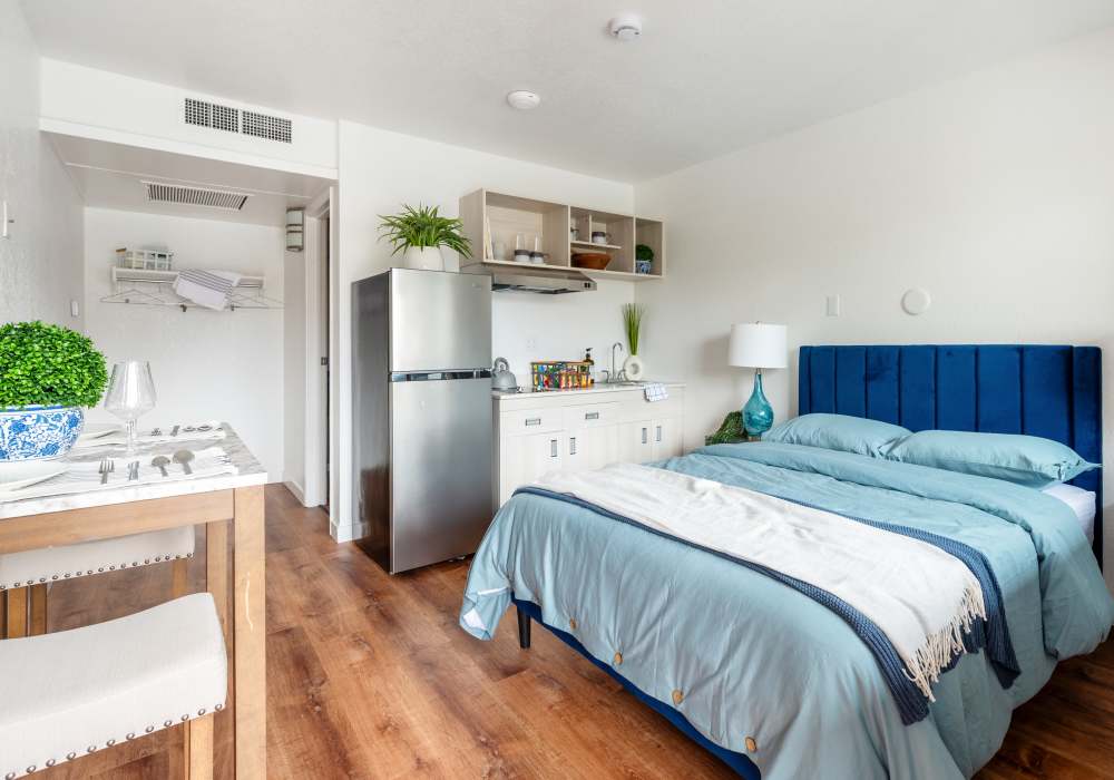 Studio apartment with kitchen and seating area Valley View Homes in Centralia, Washington