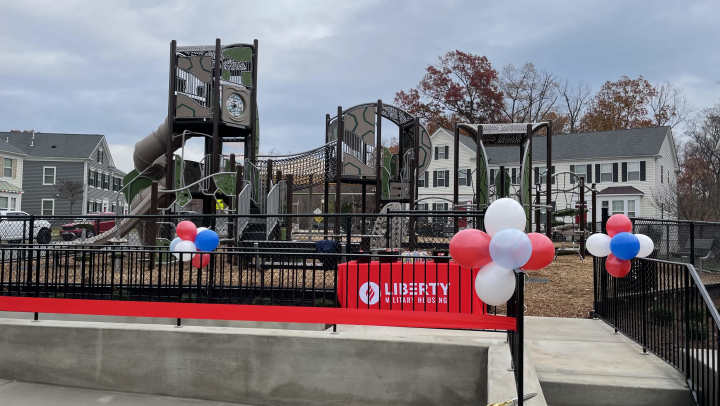 Picture of new playground decorated with banners and balloons in the Lyman Park Community