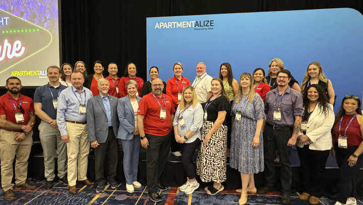 Liberty Military Housing team members pose for a group photo at NAA