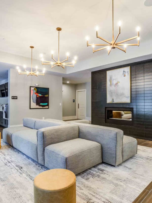 Resident clubhouse with a gas fireplace at Woodside Eleven in Greenville, South Carolina