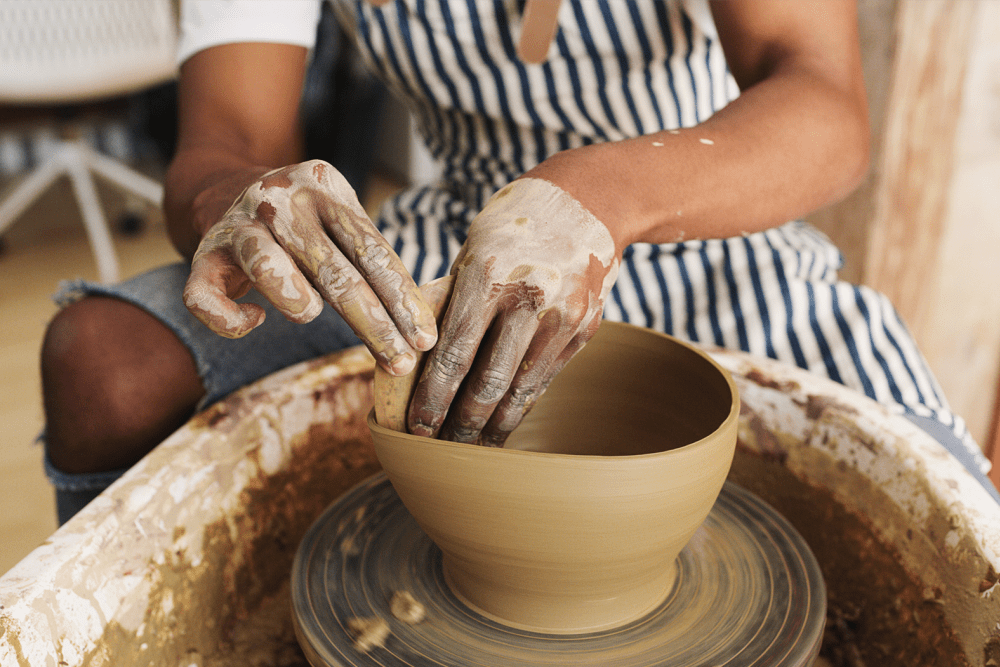 Woman making pottery at Urban WORKlofts in Seattle, Washington
