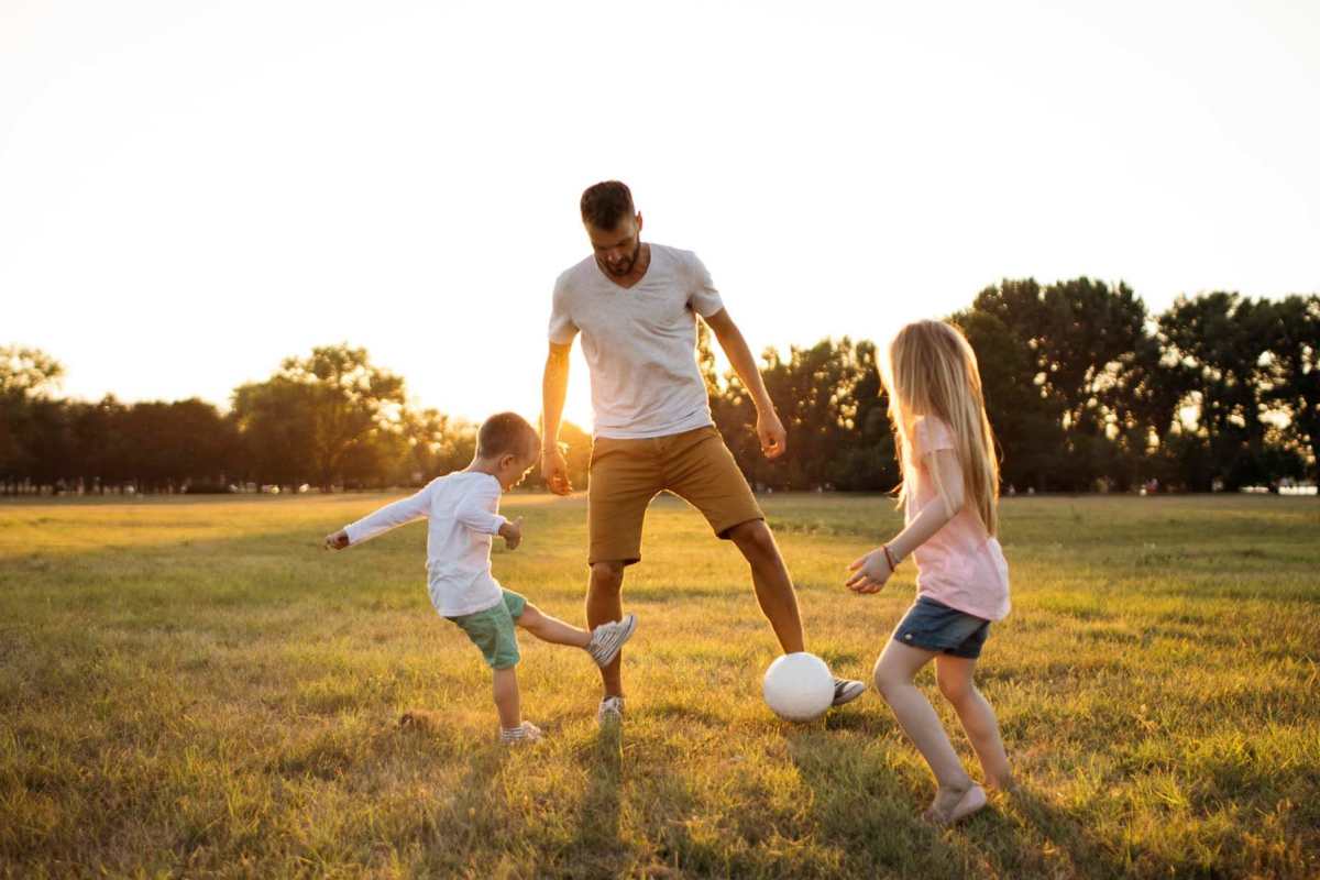  Residents playing soccer at a park near Falcon Crest Apartments in Louisville, Kentucky