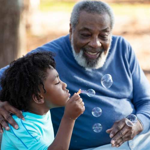 Grandfather with his grandson at Alcove at the Islands in Gilbert, Arizona