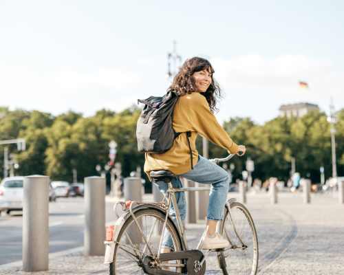 Woman cycling in the city near Radiate in Redmond, Washington
