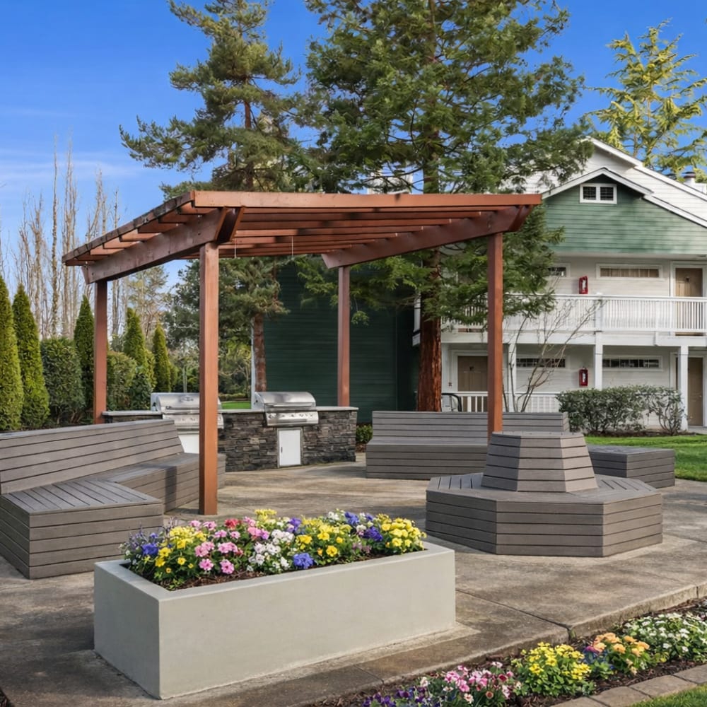 A vibrant community cabana surrounded by lush greenery at Terravista in Tacoma, Washington