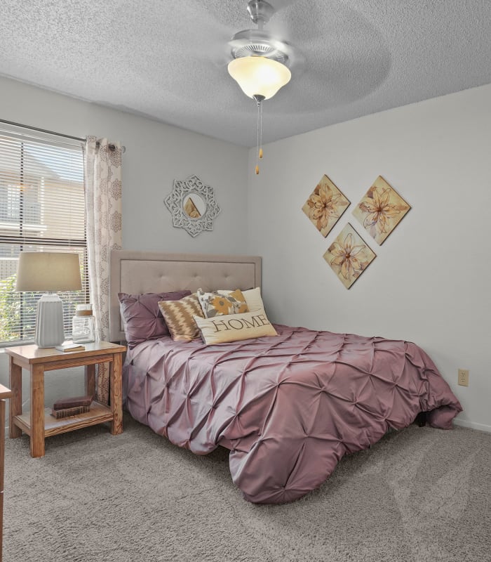 the Spacious carpeted bedroom at Cimarron Pointe Apartments in Oklahoma City, Oklahoma