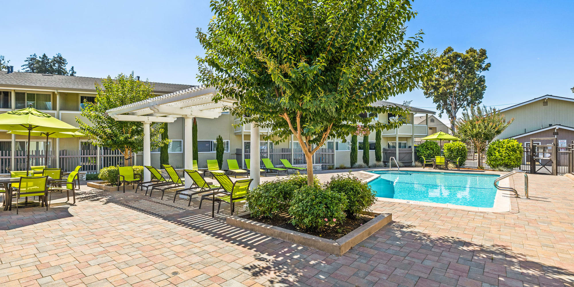 Pool and sundeck at Fremont Arms Apartment Homes in Fremont, California