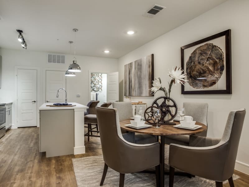 Dining room and kitchen at The Ellison in Dallas, Texas