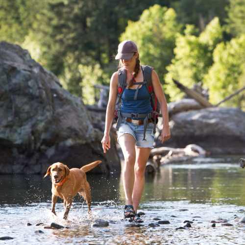 Resident hiking with her dog at Boulder Crescent in Colorado Springs,Colorado