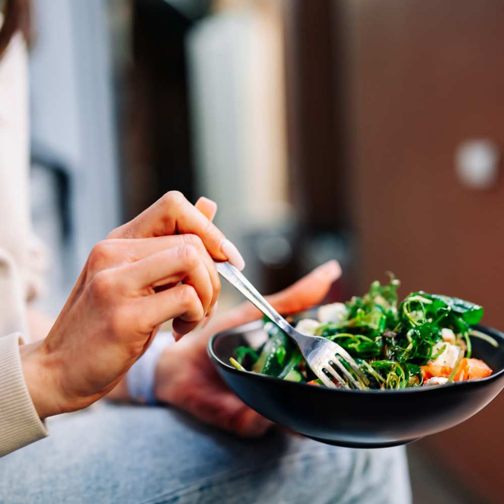 Resident eating a fresh meal near Crenshaw Trace in Wake Forest, North Carolina