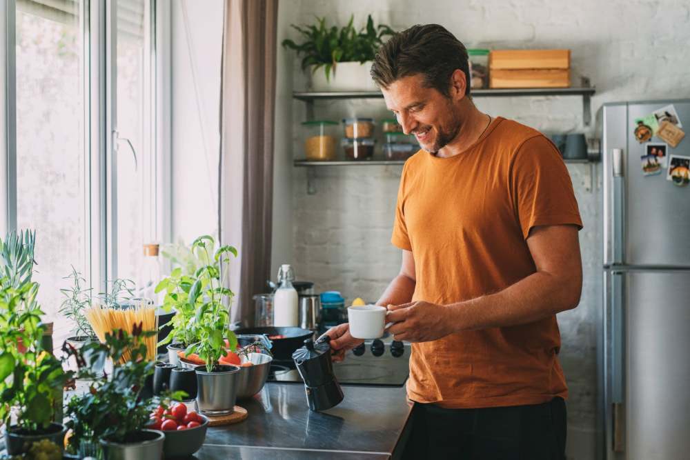 Man making some coffee at Sage Creek Apartments in Augusta, Georgia
