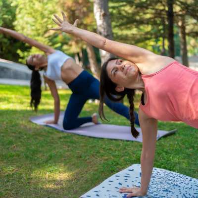 Residents doing yoga near Ludlam Point in Miami, Florida