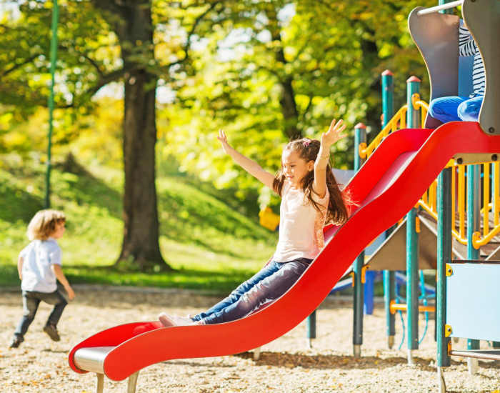 Kids playing at playground at Hayu Tilixam in Portland, Oregon