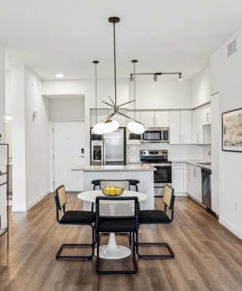 Model apartment kitchen at Residences Of Highland in Hialeah, Florida