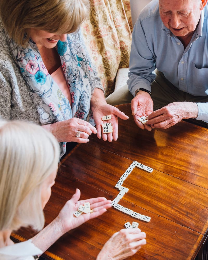 Residents playing dominoes at Governor's Pointe in Mentor, Ohio