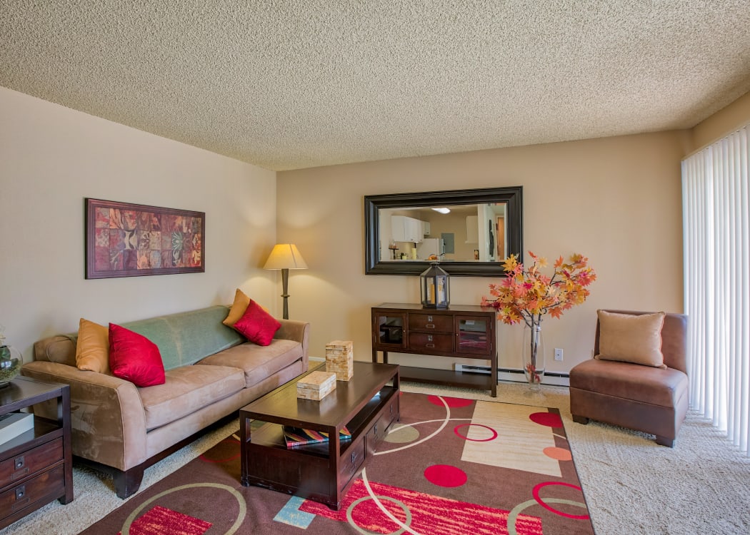 Open bright living room at The Knolls at Sweetgrass Apartment Homes