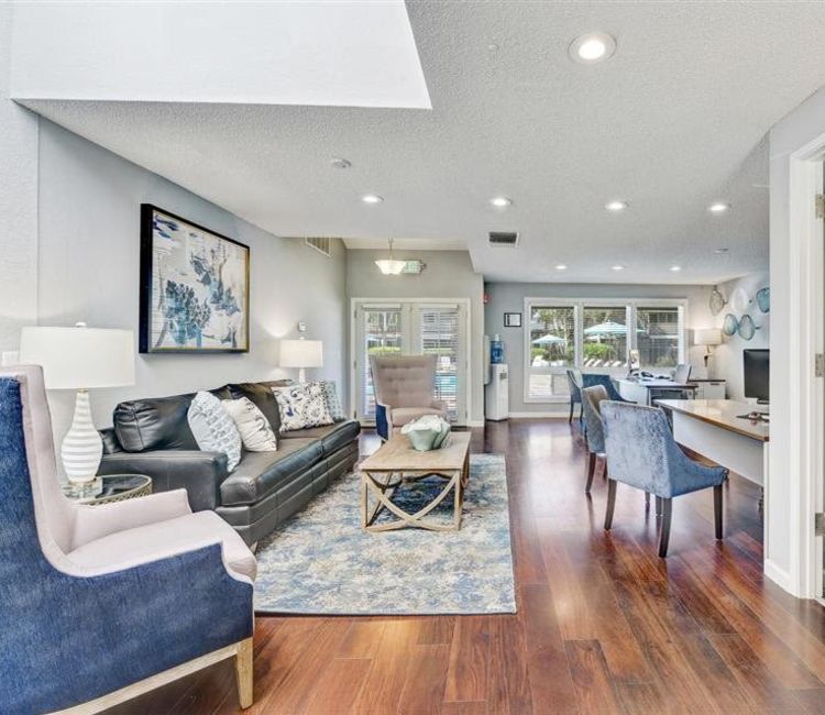 Interior of the comfortably decorated leasing office at Sofi Union City in Union City, California