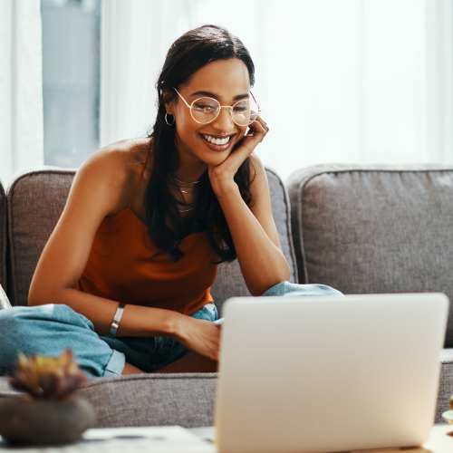 Resident Using Her Laptop at Fairways on Green Valley in Henderson, Nevada