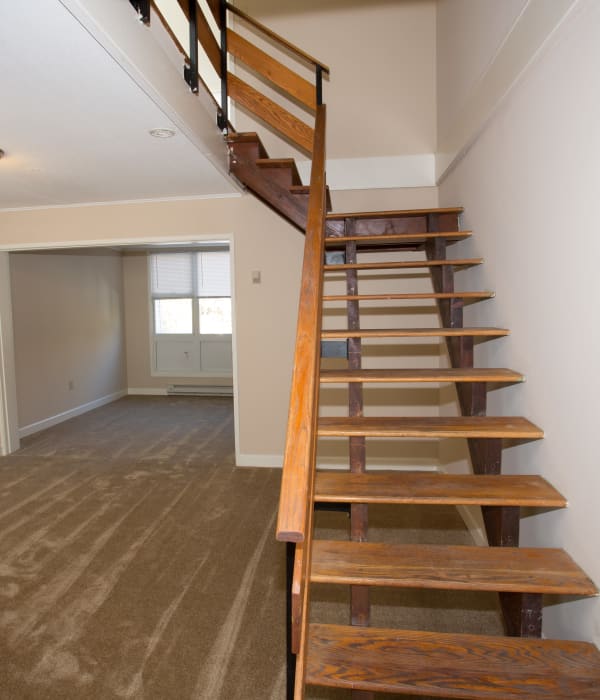 Hardwood stairs leading to apartment upstairs at Cortlandt Ridge in Ossining, New York