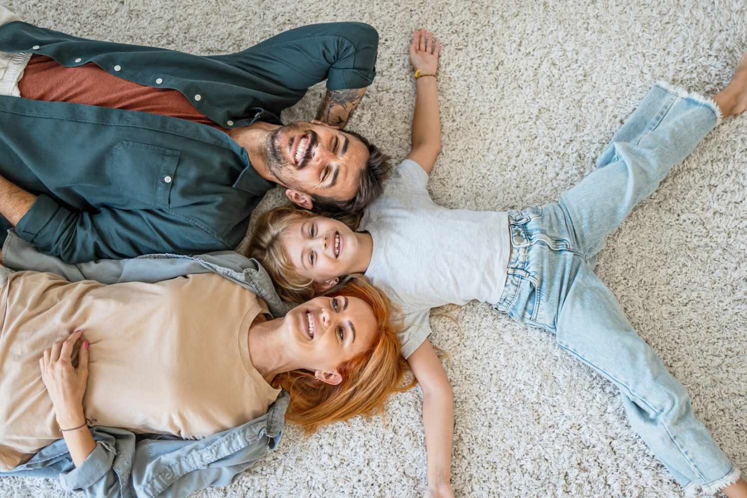 Happy family at Copper Hills Apartments in Houghton, Michigan