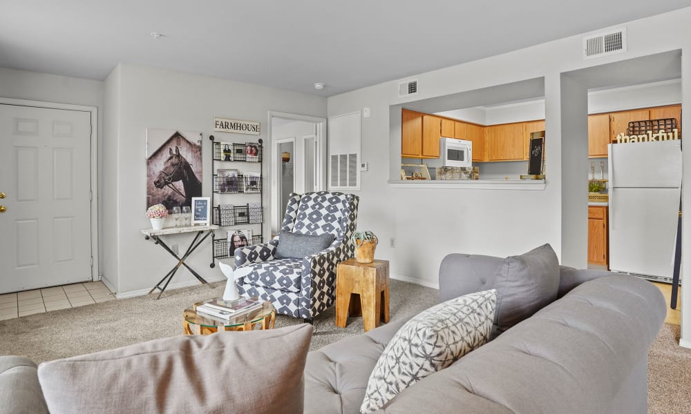 Living room  with fire place at The Remington Apartments in Wichita, Kansas