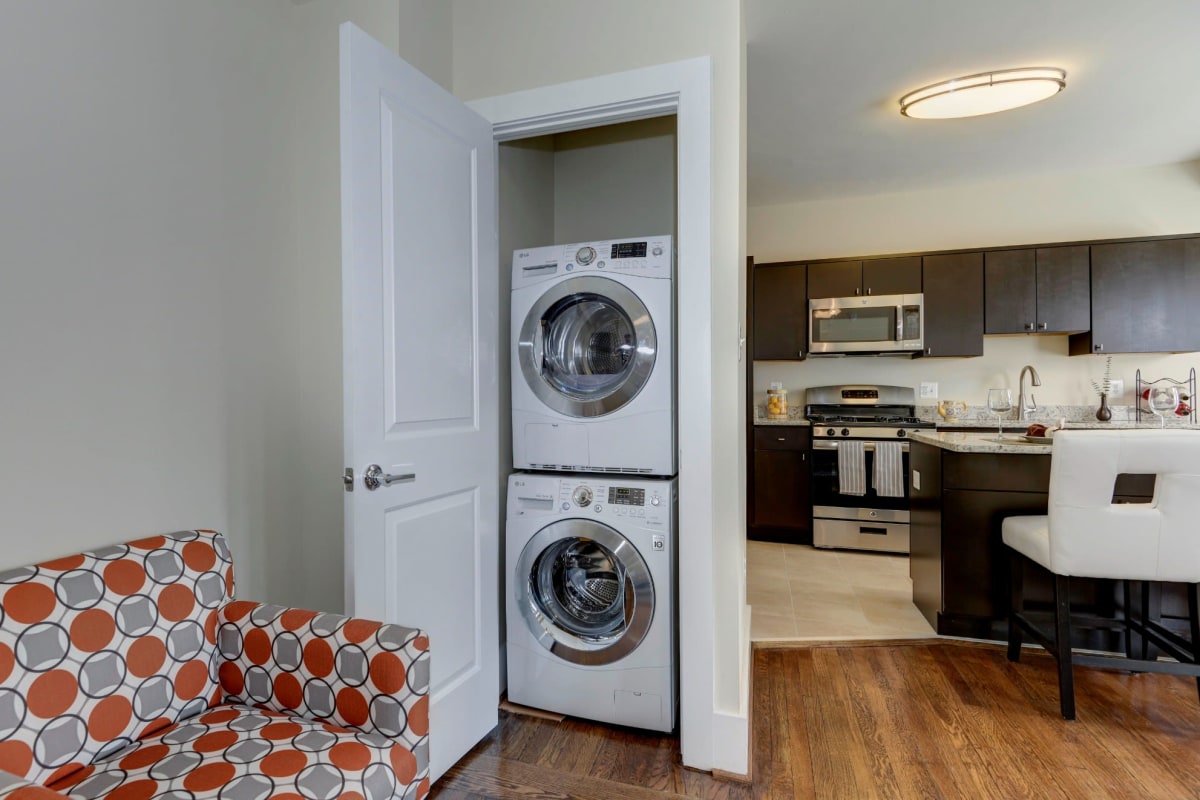 Washer and dryer located right in your living room in the closet for easy access at New Quin in Washington, District of Columbia
