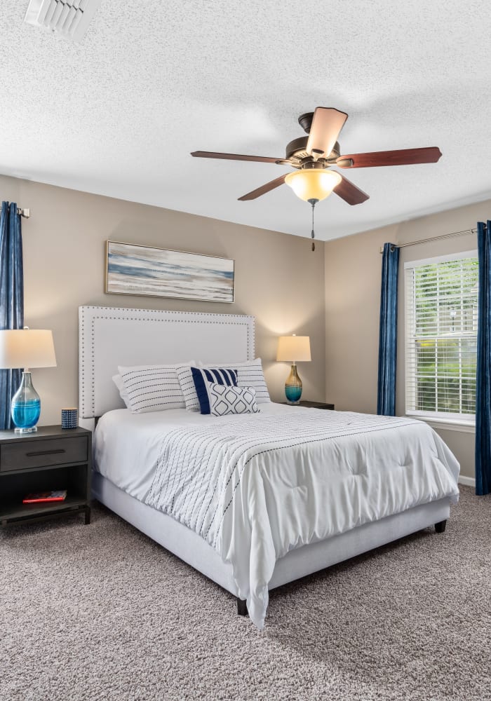 A furnished bedroom with a large closet at Gates at Jubilee in Daphne, Alabama