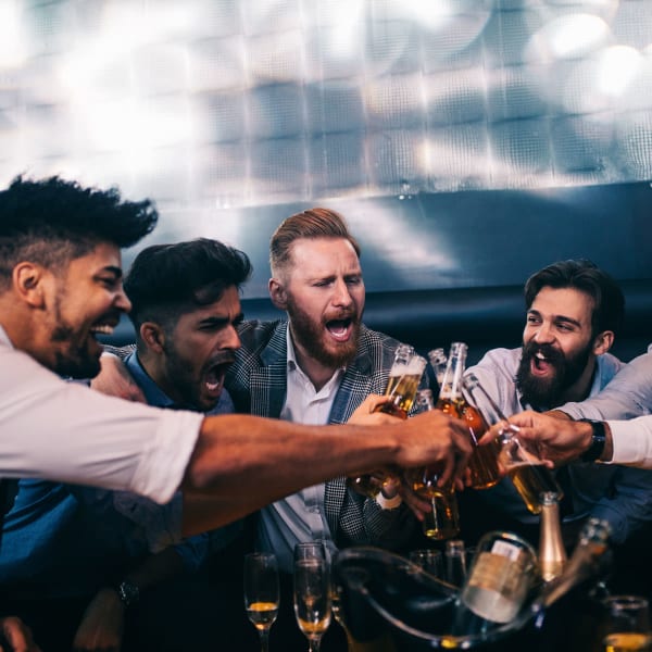 Bros toasting to a good night out near Jade Apartments in Las Vegas, Nevada