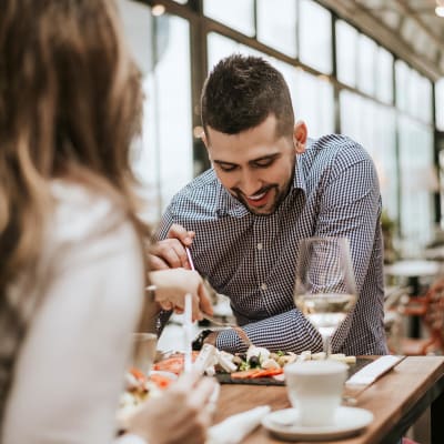 Couple enjoying lunch together at their favorite restaurant near Terra Camarillo in Camarillo, California