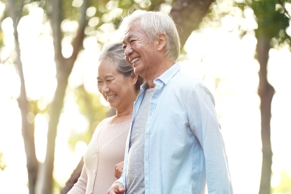 Couple smiling and walking outside at Mission Ridge in Springfield, Missouri