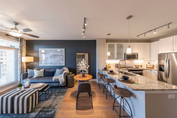 Gourmet kitchen in luxurious open-concept floor plan of a model home at Carter in Scottsdale, Arizona