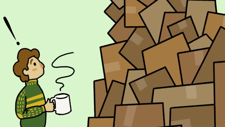 A cartoon person with brown hair stands with a coffee mug looking up at piles of cardboard boxes with a large exclamation point over his head